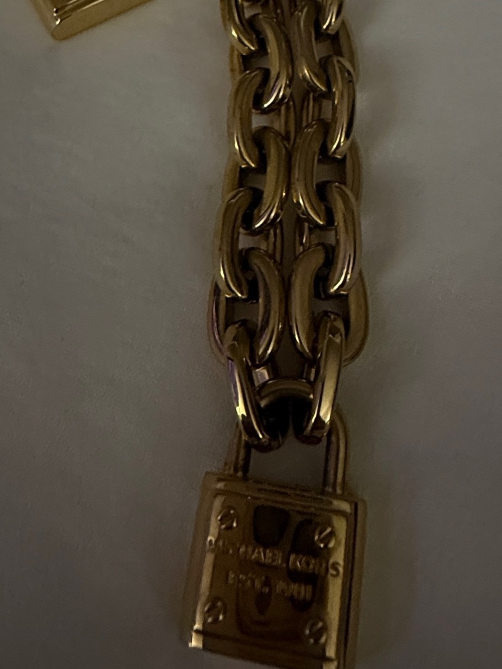 MICHAEL Michael Kors Gold-tone Padlock Chain Bracelet and a neck chain
